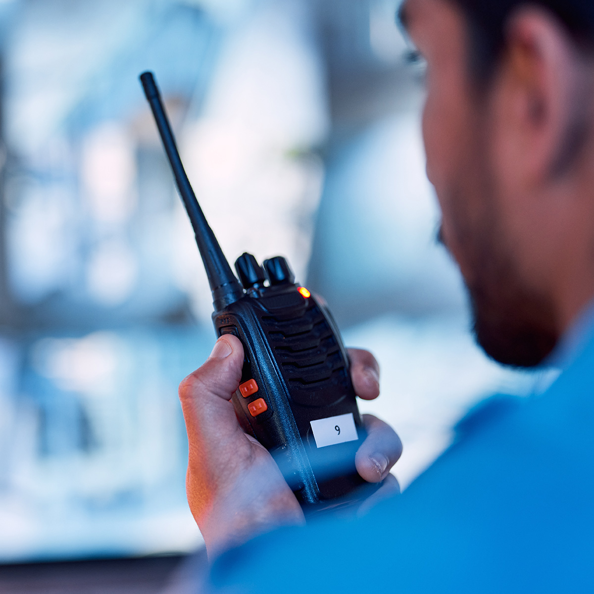 Security guard, radio and cctv monitor