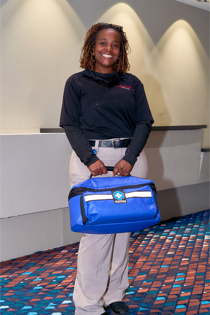 Woman holding a medical kit