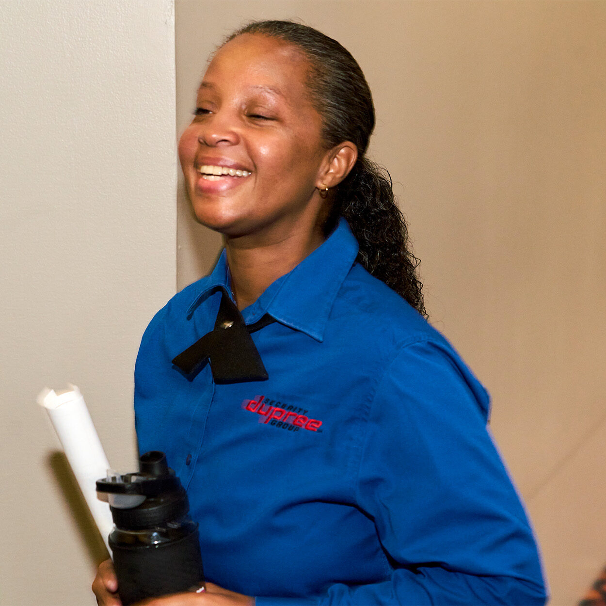Security personnel laughing